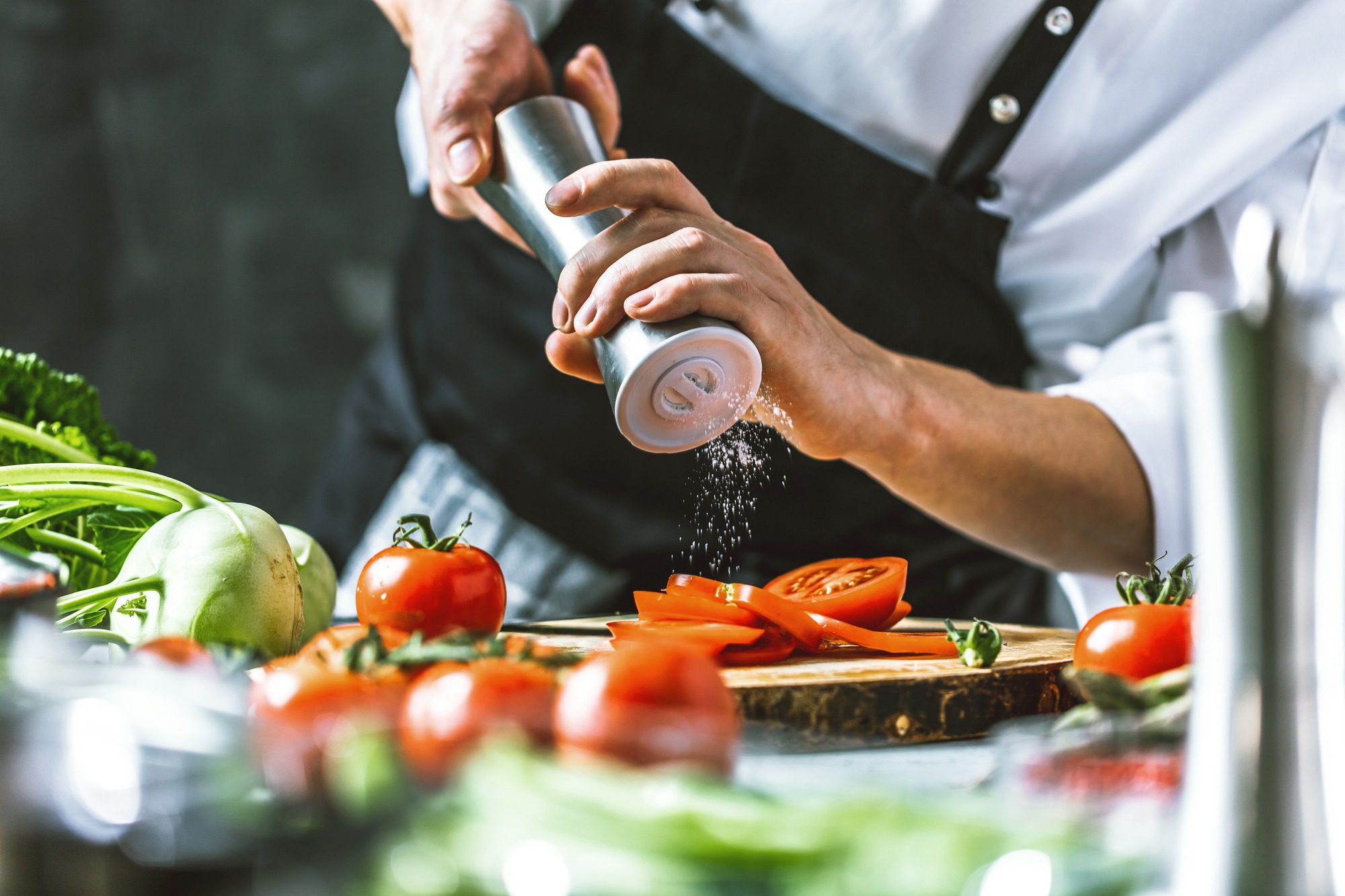 Chef Cook Preparing Vegetables in His Kitchen.